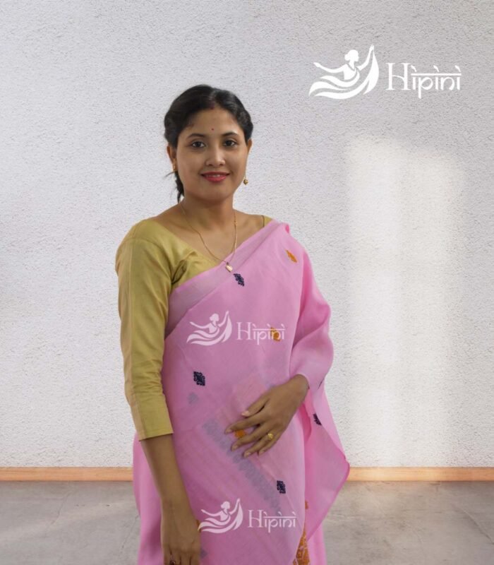 model wearing pink coloure handmade nuni cotton mekhela sador