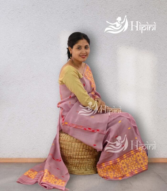 model wearing handmade nuni cotton mekhela sador