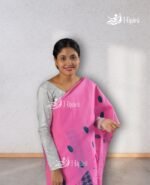 model wearing pink coloure handmade nuni cotton mekhela sador