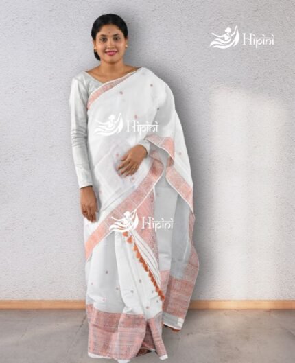 model wearing white coloure handmade (handloom) nuni cotton mekhela sador