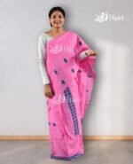 model wearing pink coloure handmade nuni cotton mekhela sador