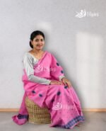 model wearing pink coloure handmade nuni cotton mekhela sador